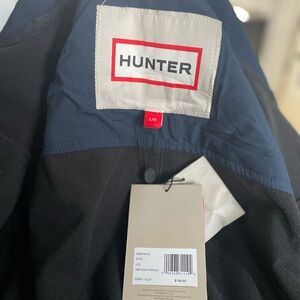 Kate Novelty Softshell Hooded Cinched Waist
Longline Snap Front Rain Coat, L